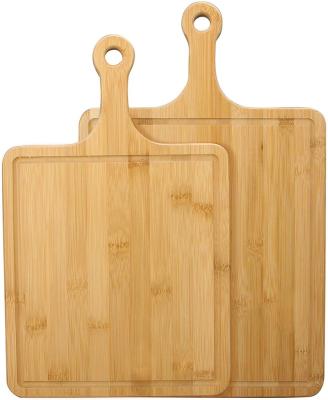 China Sustainable hot sale custom a set of premium big bamboo two cheese wooden cutting board set with handle handmade kitchen cutting board for sale