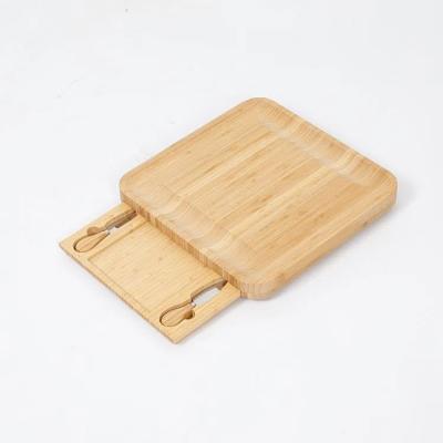 China Sustainable Eco - Friendly Cheese Slicer Cut Kitchen Tools Containers Natural Bamboo Cutting Board for sale