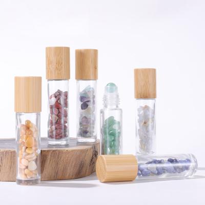 China Cosmetic Container Natural Refillable Gemstone Clear Tube 10ml Glass Roll On Bottles With Bamboo Lids for sale