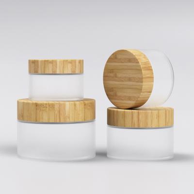 China 20g 30g 50g 100g 4oz 6oz 8oz recyclable cosmetic container set gel glass cream jar with bamboo lid for sale