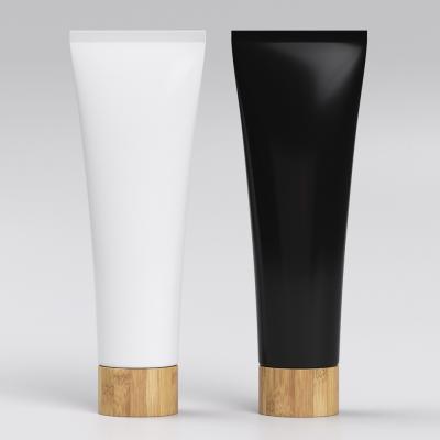 China 100g Recyclable Custom White Black Refillable Cosmetic Soft Hand Lotion Squeeze Cream Tube With Bamboo Lid for sale