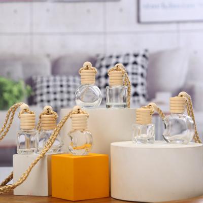 China Glass Bottle Diffuser Packaging Botol 8ml Perfume Mobil Diffuser Hanging Car Hanging Liquid Perfume Bottle for sale