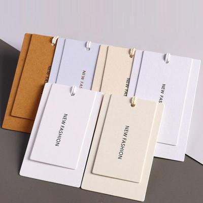 China Recoverable Custom Eco-friendly Special Cardboard Swing Tag Luxury Garment Logo Paper Tag Customized Brand Name Hang Tags For Clothing for sale