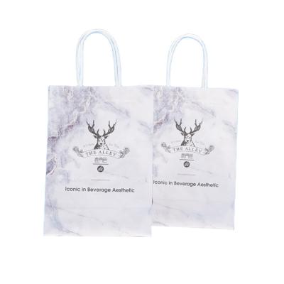 China Best Selling High Quality Biodegradable Geometric Design Paper 210gsm Gift Bags With Flat Paper Handles Custom Handmade Customized for sale