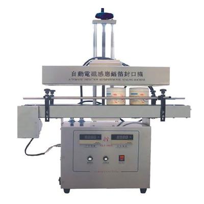 China Food Holder Type Automatic Bottle Lid Magnetic Induction Sealing Aluminum Machine for sale