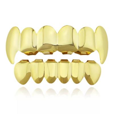 China Custom brass fashion hiphop gold teeth grills design for men for sale