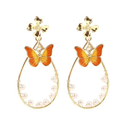 China TRENDY Gold Plated Natural Flower Enamel Butterfly Circle Earrings Freshwater Pearl Hook Earrings For Women for sale