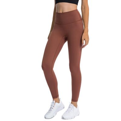 China Breathable Newcomer Pocket Pants Women Sportswear Gym Hot Feeling Naked Yoga SWEETS Yoga Gaiters High Waist Butt Lift Back Yoga Tights for sale