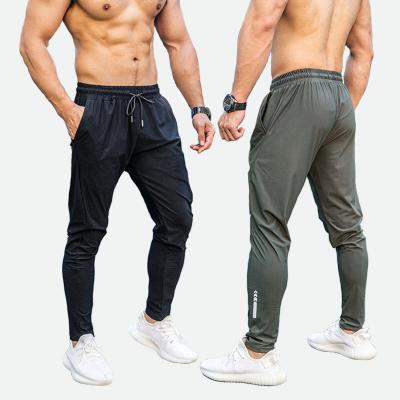 China QUICK DRY Mens Slim Fit Sport Pants Joggers Sweatpants Men Clothes Streetwear Casual Track Running Pants For Fitness Workout for sale