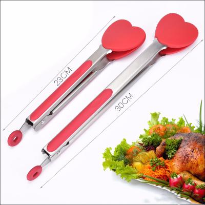 China Hot Selling Viable Heart Shape Bread Cake Kitchen Silicone Tongs Food Tongs With End Ring for sale