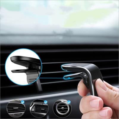 China Flexible Universal Mobile Phone Holder Magnetic Holder L Shape Magnetic Phone Holder Car Air Vent Mount Clip Mobile Phone Holder for sale