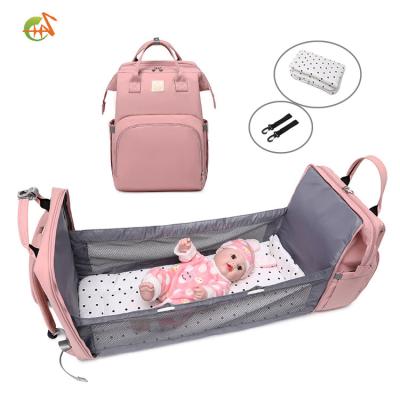 China 2021 Waterproof Foldable Waterproof Diaper Bag Multifunctional Hutch With Changing Mat Baby Bed Bag for sale