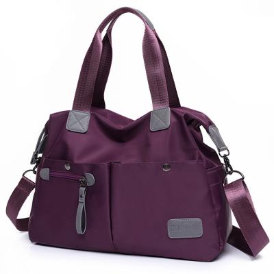 China Latest Polyester Fabric Nylon Sling Shoulder Messenger Bag Female Students Bags For Ladies for sale