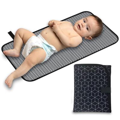 China New Travel Waterproof Warm Lightweight Machine Washable Foldable Baby Changing Mat Portable Diaper Small Changing Pad for sale