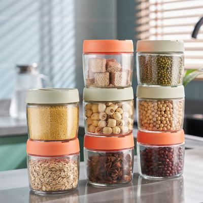 China Multifunctional Airtight Storage Jars Kitchen Storage Box Grain Glass Kitchen Moisture Proof Storage Containers for sale