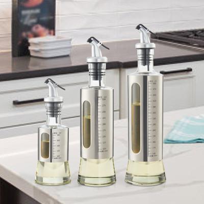 China Multifunctional custom containers oil bottle and vinegar dispenser bottle with pourer drizzle lid for sale