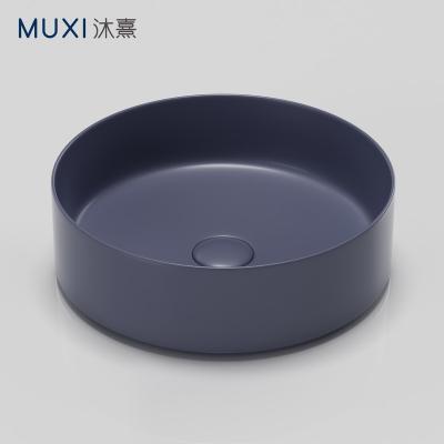 China New Modern Round Matt Blue Bathroom Sink Ceramic Color Wash Basin Matt Color Art Basin Bathroom Hand Sink for sale