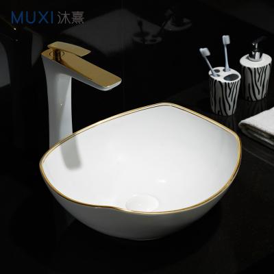 China Luxury Luxury Gold Line Ceramic Gold Line Art Basin For Hotel Basin Sanitary Ware Gold White Sink Countertop Wash Basin for sale