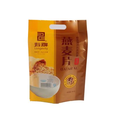 China Custom Printed Dry Food Oatmeal Snack Food Holder Up Pouch Print Quadruple Ziplock Sealed Food Packaging Plastic Bags for sale