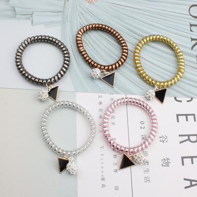 China Comfortable Elastic Telephone Wiring Rope Head Ties Flower Hair Band Rope With Charming Crystal Metal Charms for sale