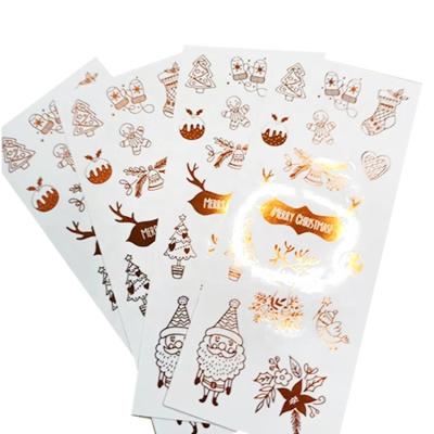 China Waterproof 2022 Long YI DA Anime Custom Christmas Bronzing Label Sticker Vinyl Embossed Transparent Stickers for sale