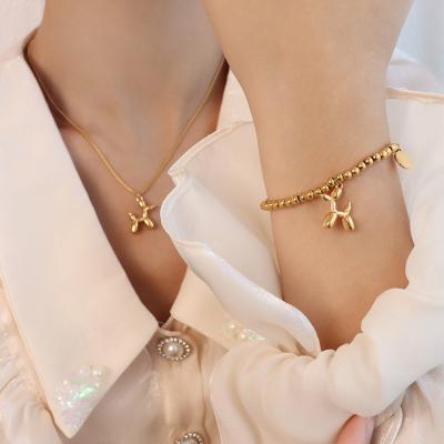 China Jewelry Bangle Lady Good Luck Dog Charm Hypoallergenic Cute Elastic Round Bead Chain Adjustable 18K Gold Stainless Steel for sale