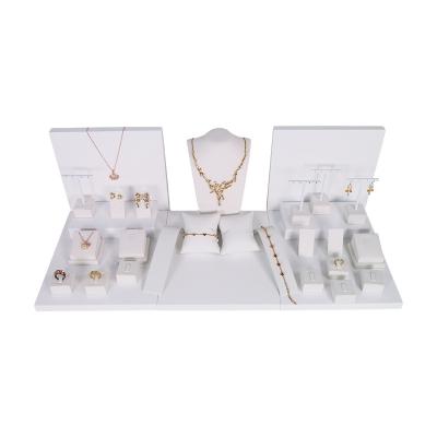 China Beautiful PU Necklace Ring Display Set MDF Holder White Leather Wooden Jewelry Display Set For Jewelry Shop Counter for sale