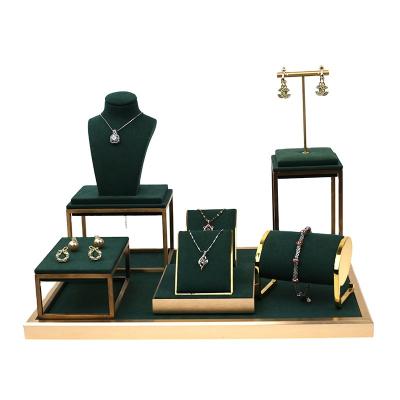 China Beautiful Customized Green Microfiber Jewelry Display Metal Frame Jewelry Rack For Jewelry Display Showcase for sale