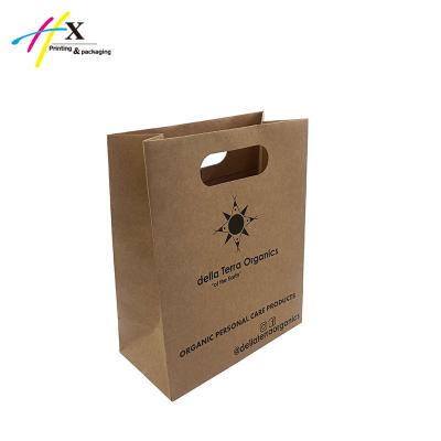 China Recycled Materials Recycled Handmade Brown Kraft Paper Shopping Bag Gift Bag With Die Cut Handle for sale