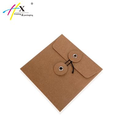 China Brown Paper Gift Envelope Square Kraft Paper Envelope With String And Button Closure for sale