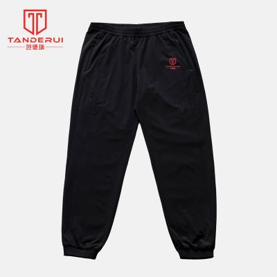 China Wholesale Black Quick-drying Anti-wrinkle Pants Men's Elastic Loose Sports Casual Ribbed Quick-Dry Pants for sale