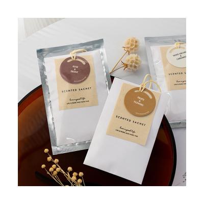 China Sustainable Minimalist Natural Vermiculite Wardrobe Perfume Paper Bags Clothes Scent Sachet for sale