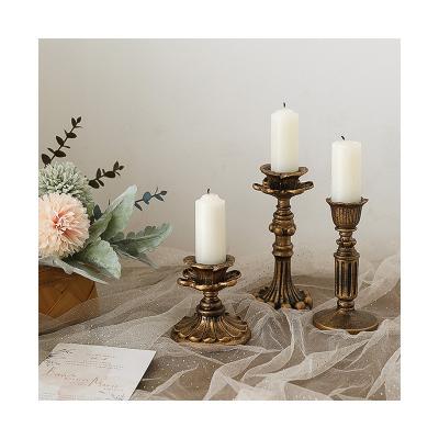 China Decorative Old Gold Floor Resin French Classic Tall Candle Holder for sale