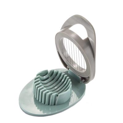 China China Manufacturer Sustainable Plastic Kitchenware Stocked Instruments Fruit Salad Slicer for sale