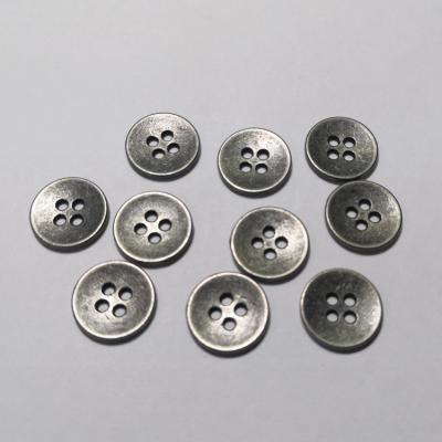 China Garment metal buttons cheap material wholesale fashion price style simple style buttons round shape metallic for clothes for sale