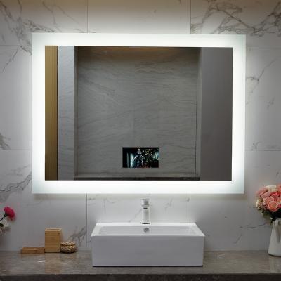 China Luminous Rectangle Hotel Bathroom LED Lighted TV Mirror for sale