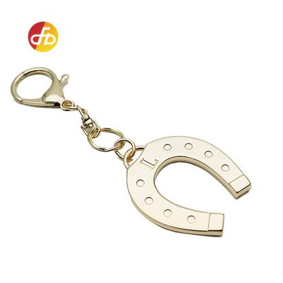 China Nickel free metal wholesale custom logo enamel supplier china letter U key chain for handbag hanger tag for sale