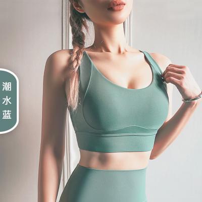 China Good Quality Peach Wholesale Logo Women Gym Breathable Custom Running Bra Yoga Backless Vest for sale