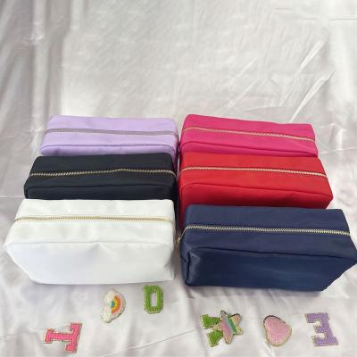 China Wholesale Fabric Running Nylon Pouch Colorful Zippered Cosmetic Bag Can Be Customized Make Up Bag With Chenille Letter Patches for sale