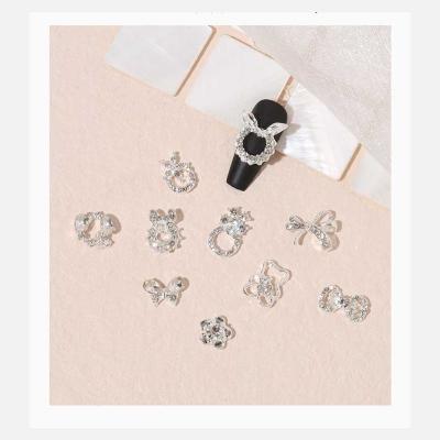 China Art Accessories Crystals Jewelry Rhinestone Nails Zircon Bear Art Decoration New Bowknot Garland Nail Small Sure Decorations Charms for sale