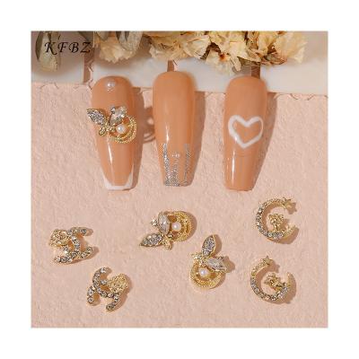 China 2022 Hot Selling Price Nail Art Decoration Amazonaon Nail Art Charms 3d Accessories Metal Zircon Alloy Butterfly Cheap cc Nail for sale