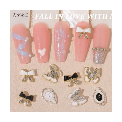 China Nail Art Decoration 2022 New Metal Charms for Nail Art Luxury Bow Knot Butterfly Alloy Gold Sliver Manicure Bear 3d Diamond Jewelry Accessories for sale