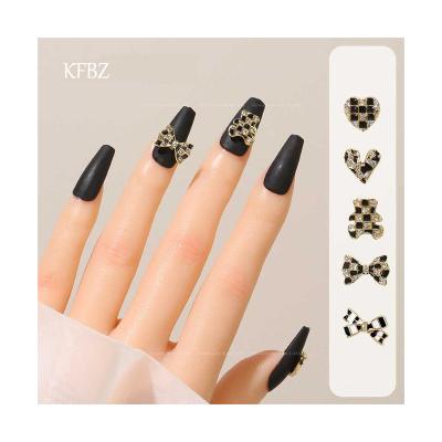 China Cute Black And White Checked Nail Art Decoration New Arrival 3d Metal Alloy Butterfly Bow Diy Diy Charms for sale