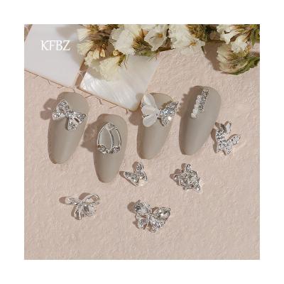 China Zircon Alloy Metal Butterfly Nail Rhinestone Diamond Silver Glitter Nail Art Jewelry 3d Butterfly Bow Decoration New Nail Art for sale