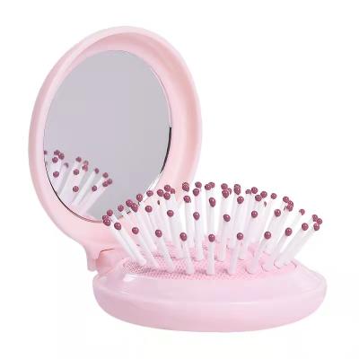 China Plastic Comfortable Round Mini Pocket Hair Brush Comb With Mirror for sale