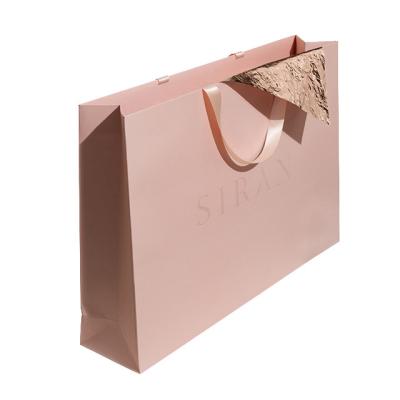 China Recyclable Custom Private Logo Printed Personalized Luxury Shopping Tote Gift Paper Bags With Handle for Clothes Packaging for sale