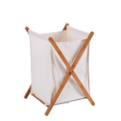 China Household Modern Folding X-structure Bamboo Laundry Hamper Clothes Storage Basket Trash Bag for sale