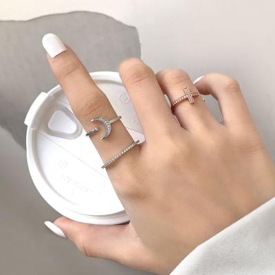 China Fashion Foxi Jewelry Diamond Ring Cubic Zirconia Trendy Cross Rose Gold Sterling Silver Ring Women Jewelry for sale