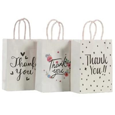 China Customized takeaway Promotional Printed On White Kraft Shopping Paper Bag with Handle for sale