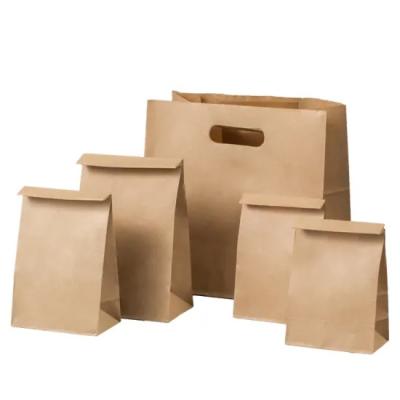 China Wholesale Food Packaging Die Cut Takeaway Carry Brown Kraft Paper Bag with Your Own Logo for sale